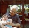 Another of Great Grandpa B. holding me.